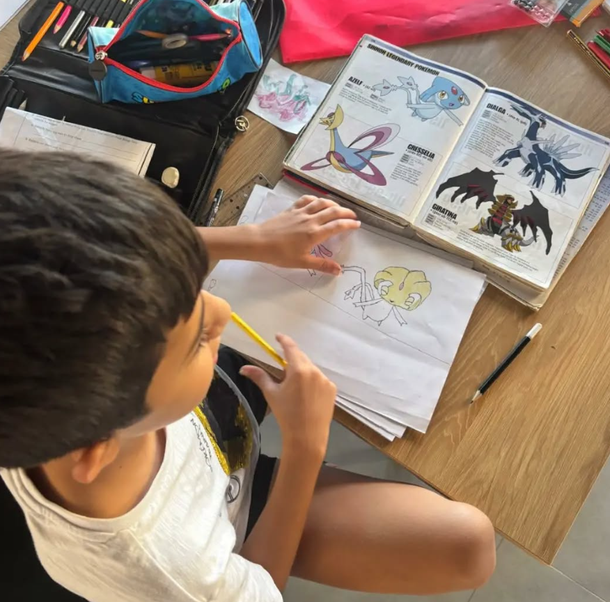 A child drawing during a visual storytelling session